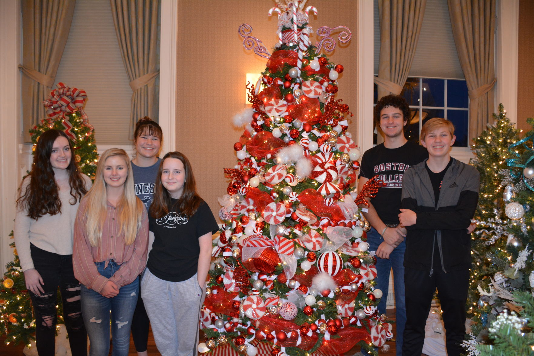 4-Hers decorate festive candy cane tree